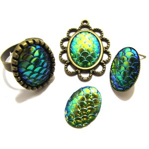 https://www.deida.ro/14227-20368-thickbox/crs68-cabochon-rasina-solzi-sirena-bleu-verzui-si-auriu-oglinda-efect-ab-1813mm-.jpg