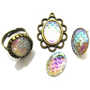 https://www.deida.ro/15335-21805-thickbox/crs82-cabochon-rasina-solzi-sirena-clear-oglinda-efect-ab-1813mm-.jpg