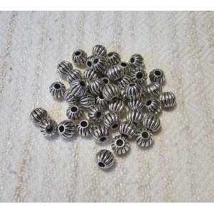 https://www.deida.ro/21688-39607-thickbox/di07-30-buc-distantier-argintiu-antic-5mm.jpg