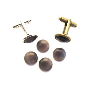 https://www.deida.ro/3584-5166-thickbox/cabochon-sticla-cat-eye-gri-usor-movuliu-12mm.jpg
