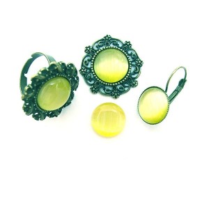 https://www.deida.ro/4680-6647-thickbox/cabochon-sticla-cat-eye-galben-lamaie-14mm-stoc-limitat.jpg