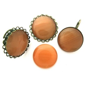 https://www.deida.ro/5032-7220-thickbox/cabochon-sticla-cat-eye-portocaliu-piersica-25mm.jpg