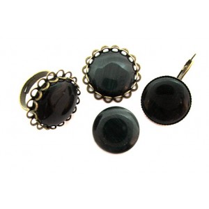 https://www.deida.ro/5040-7239-thickbox/cabochon-sticla-cat-eye-negru-cu-reflexii-gri-20mm.jpg
