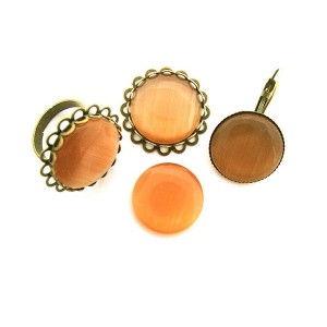 https://www.deida.ro/5070-7297-thickbox/cabochon-sticla-cat-eye-portocaliu-20mm.jpg