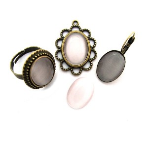 https://www.deida.ro/5180-7561-thickbox/cabochon-sticla-cat-eye-alb-rozaliu-1813mm.jpg