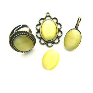 https://www.deida.ro/5196-7595-thickbox/cabochon-sticla-cat-eye-galben-lamaie-1813mm.jpg