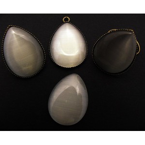 https://www.deida.ro/8419-11874-thickbox/cabochon-sticla-cat-eye-lacrima-alba-2518mm.jpg